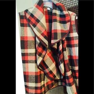 Vest winters wear over a long sleeve shirt